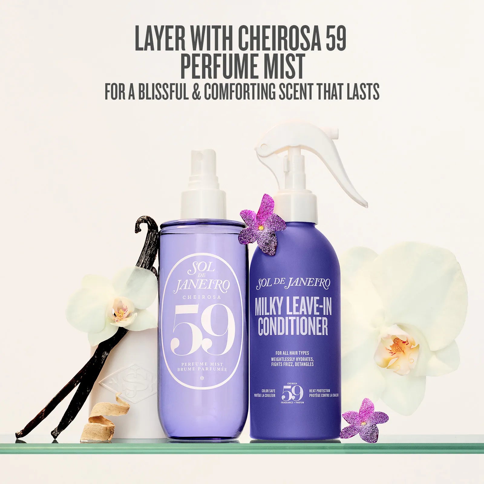 Two purple bottles with floral decorations on a white background