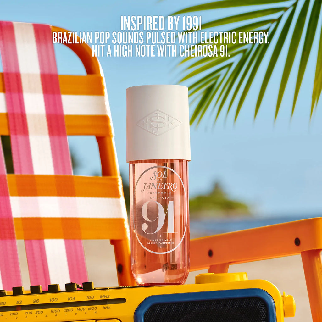 Cheirosa 91 perfume bottle on a colorful chair with palm leaves and blue sky in the background