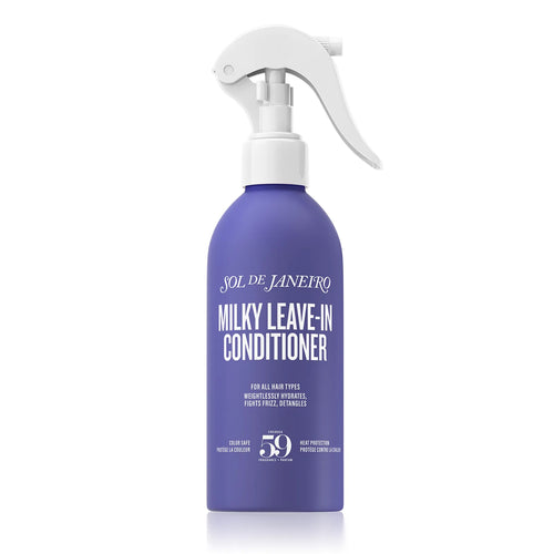 Purple bottle of Sol de Janeiro Milky Leave-In Conditioner with white spray nozzle on a white background