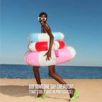 Woman on a beach with colorful inflatable rings and a bottle, with text overlay.