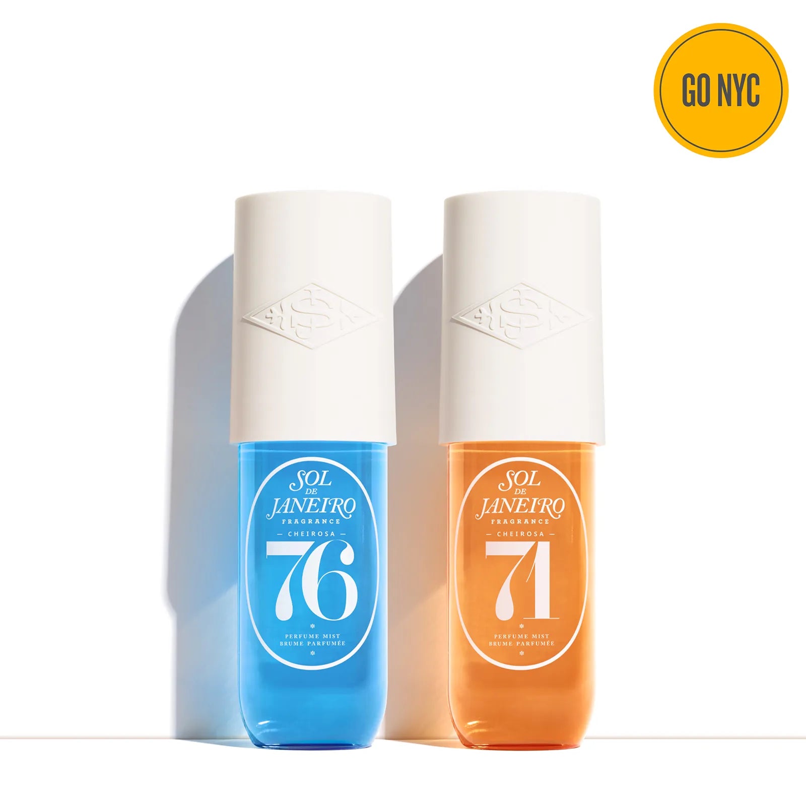 Two bottles of Sol de Janeiro products with '76' and '71' on a white background, featuring the Go NYC logo.